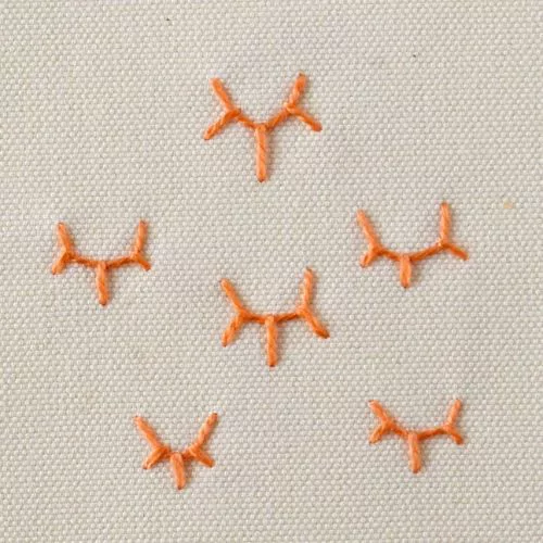 Ricamo a punto corona