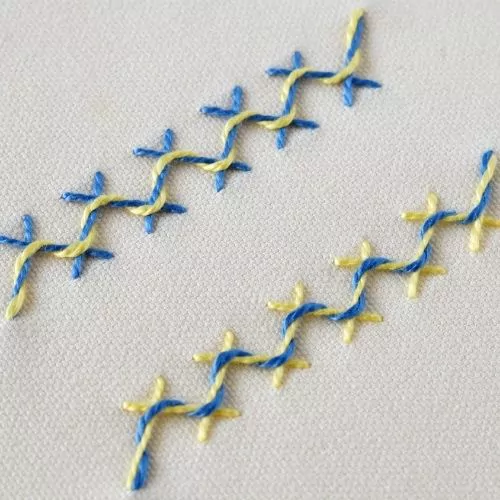 Punto a spina di pesce allacciato